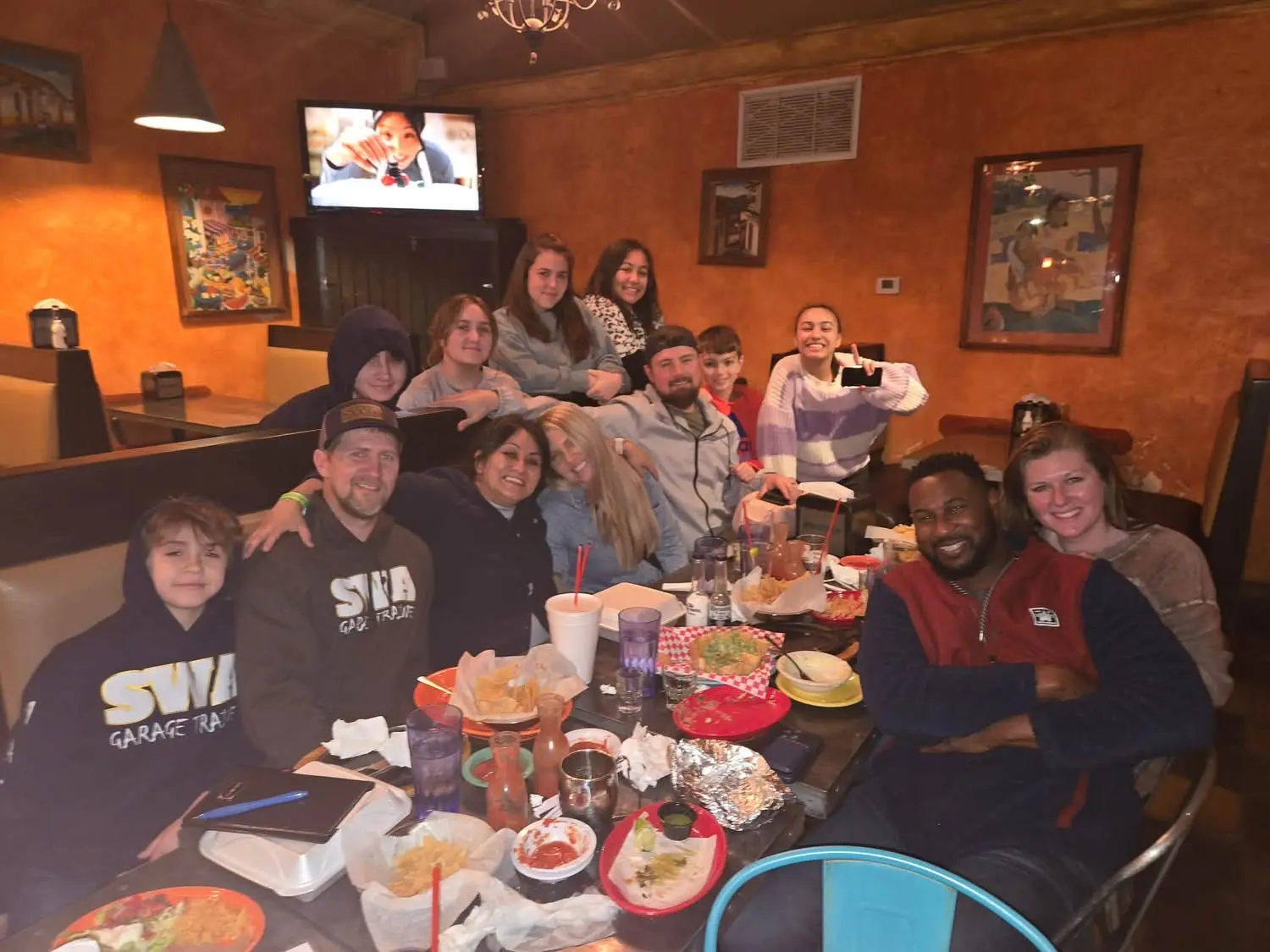 Wrestling families and friends gathered together away from competition