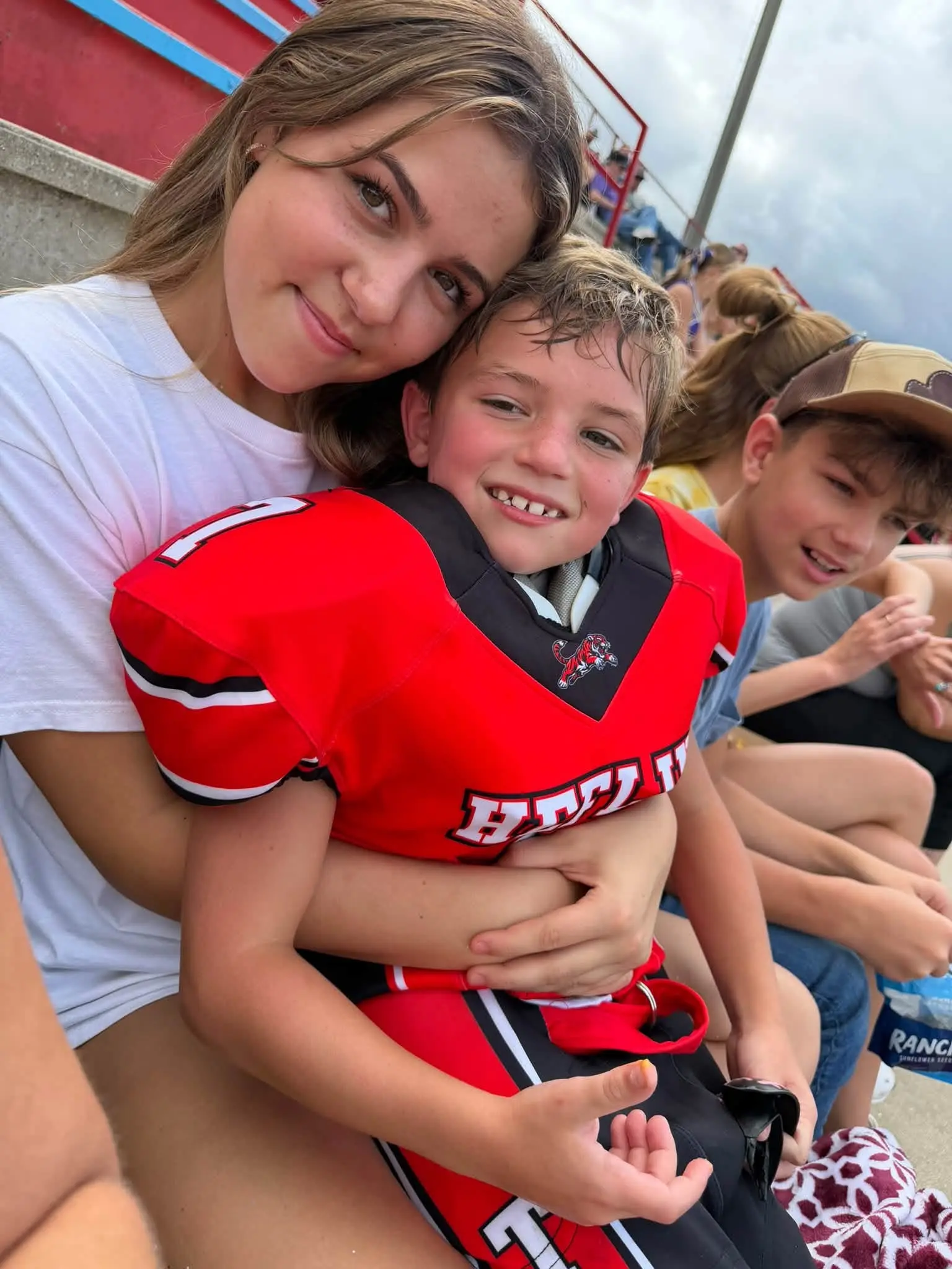 Heflin Tigers player with family on game day